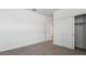 Neutral bedroom, light from door, adjacent to closet at 5865 E Axle Ln, San Tan Valley, AZ 85140