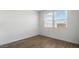 Bright bedroom featuring tile floors, neutral walls, and large windows for natural light at 5865 E Axle Ln, San Tan Valley, AZ 85140