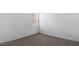 Bright and airy bedroom with natural light, carpeted, and electrical outlets at 5865 E Axle Ln, San Tan Valley, AZ 85140