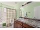 Neutral bathroom featuring a single sink vanity with a shower-tub combination at 620 N Entrada St, Chandler, AZ 85226