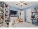 Inviting bedroom with lots of natural light, and plenty of toy storage at 620 N Entrada St, Chandler, AZ 85226