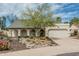 Charming single-story home with desert landscaping and a two-car garage in a quiet neighborhood at 620 N Entrada St, Chandler, AZ 85226