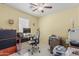 Bright home office with a ceiling fan and tile flooring at 620 N Entrada St, Chandler, AZ 85226