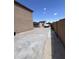 Spacious backyard featuring two storage sheds and a covered trailer or boat, perfect for storing outdoor equipment at 6808 W Maldonado Rd, Laveen, AZ 85339