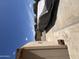 Storage shed and covered vehicle on a sunny day at 6808 W Maldonado Rd, Laveen, AZ 85339