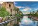 Breathtaking community near the river with scenic views and mature palm trees at 7175 E Camelback Rd # 902, Scottsdale, AZ 85251
