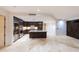 Gourmet kitchen with stainless steel appliances, custom cabinetry, and island at 7175 E Camelback Rd # 902, Scottsdale, AZ 85251