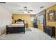 Large bedroom with textured wallpaper, a ceiling fan, a zebra rug, and large window with shades at 7734 W Terri Lee Dr, Phoenix, AZ 85035
