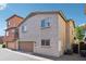 Charming two-story home featuring a well-kept lawn and a convenient two-car garage at 7734 W Terri Lee Dr, Phoenix, AZ 85035