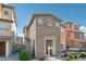 Inviting two-story house boasting stone facade, well-maintained yard, and stylish front door at 7734 W Terri Lee Dr, Phoenix, AZ 85035