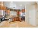 Well-lit kitchen with stainless steel appliances, tile backsplash, and ample counter space at 7734 W Terri Lee Dr, Phoenix, AZ 85035
