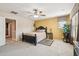 Bright main bedroom with zebra rug, ceiling fan, and a large window with natural light at 7734 W Terri Lee Dr, Phoenix, AZ 85035