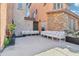 Cozy outdoor patio featuring comfortable seating arrangements for relaxing and entertaining at 7734 W Terri Lee Dr, Phoenix, AZ 85035