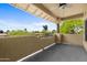 Relaxing balcony offers views of mature trees at 9100 E Raintree Dr # 239, Scottsdale, AZ 85260