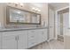 Spacious bathroom with double vanity, granite counters, and a separate walk-in shower at 9100 E Raintree Dr # 239, Scottsdale, AZ 85260