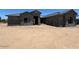 New single-story home showing unfinished stucco exterior with visible roofline at 11140 W Prospector Dr, Queen Creek, AZ 85144