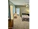 Bedroom with ceiling fan and window with neutral decor at 13783 W Caribbean Ln, Surprise, AZ 85379
