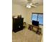 Bedroom featuring neutral carpet, window, and ceiling fan at 13783 W Caribbean Ln, Surprise, AZ 85379