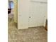 Hallway featuring neutral carpet, doors, and convenient access to rooms at 13783 W Caribbean Ln, Surprise, AZ 85379