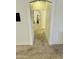 Bright hallway showcasing neutral carpet and access to multiple rooms at 13783 W Caribbean Ln, Surprise, AZ 85379