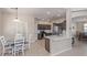 Open concept kitchen and breakfast nook with stainless steel appliances at 15324 W Windsor Ave, Goodyear, AZ 85395