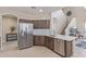 Bright kitchen with stainless steel appliances, a sink, and a view of the backyard at 15324 W Windsor Ave, Goodyear, AZ 85395