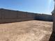 Huge backyard with block wall and landscaping at 17788 W Odeum Ln, Goodyear, AZ 85338