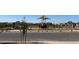 Community playground and park featuring picnic benches and lush landscaping at 17788 W Odeum Ln, Goodyear, AZ 85338