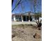 Lovely single-story home featuring a cozy covered front porch with rustic supports and drought-tolerant landscaping at 1836 W Las Palmaritas Dr, Phoenix, AZ 85021