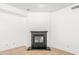 Corner fireplace with traditional design, neutral wall color and tile floors at 2036 S Reseda Ct, Gilbert, AZ 85295