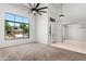 Open-concept living room with abundant natural light, and neutral tones at 2036 S Reseda Ct, Gilbert, AZ 85295