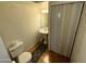 Small bathroom with white fixtures, mirror, and vanity at 2051 W Elm St, Phoenix, AZ 85015