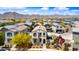 Beautiful home showcasing professional landscaping, hardscape, and neighborhood mountain views at 20812 W Legend Trl, Buckeye, AZ 85396
