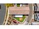 Aerial view of a well-maintained roof and backyard with an inviting outdoor living space at 20812 W Legend Trl, Buckeye, AZ 85396
