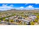 Scenic aerial view of home with lush landscaping and stunning mountain views at 20812 W Legend Trl, Buckeye, AZ 85396