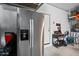 Garage features a refrigerator and assorted storage at 20812 W Legend Trl, Buckeye, AZ 85396