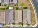 Aerial view of three single-Gathering homes with tile roofs and desert landscaping in a suburban neighborhood at 22560 E Rosa Rd, Queen Creek, AZ 85142