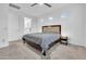 Spacious bedroom featuring neutral carpet, a ceiling fan, and ample natural light at 22560 E Rosa Rd, Queen Creek, AZ 85142