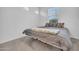 Cozy bedroom with plush carpeting and lots of natural light at 22560 E Rosa Rd, Queen Creek, AZ 85142