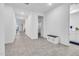 Bright hallway with tile flooring, neutral walls and ample natural light at 22560 E Rosa Rd, Queen Creek, AZ 85142