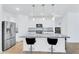 Stylish kitchen with granite countertops, stainless steel appliances, and a large center island at 22560 E Rosa Rd, Queen Creek, AZ 85142