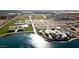 Aerial view of sports complex with playgrounds, lake, sports courts, baseball fields and parking at 22560 E Rosa Rd, Queen Creek, AZ 85142