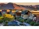 Shopping center with mountain views and pedestrian-friendly streetscape at 22560 E Rosa Rd, Queen Creek, AZ 85142