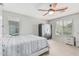 Serene bedroom with neutral walls, ceiling fan, and carpeted floors for a relaxing atmosphere at 2559 N 73Rd Dr, Phoenix, AZ 85035