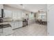 Open-concept kitchen and dining area with stainless steel appliances and ample countertop space at 2559 N 73Rd Dr, Phoenix, AZ 85035