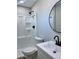 Modern bathroom featuring new shower stall, white vanity with black hardware, new faucet, and new mirror at 3049 W Dahlia Dr, Phoenix, AZ 85029