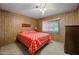 Bedroom features a ceiling fan, and a comfortable queen-sized bed at 3160 E Main St # 110, Mesa, AZ 85213