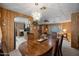 Charming dining room with chandelier, seamlessly connected to the kitchen at 3160 E Main St # 110, Mesa, AZ 85213