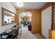 Inviting entryway with light wood paneling and open floorplan for seamless flow throughout the home at 3160 E Main St # 110, Mesa, AZ 85213