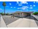 Charming home with gravel landscaping and a long covered parking area at 3160 E Main St # 110, Mesa, AZ 85213